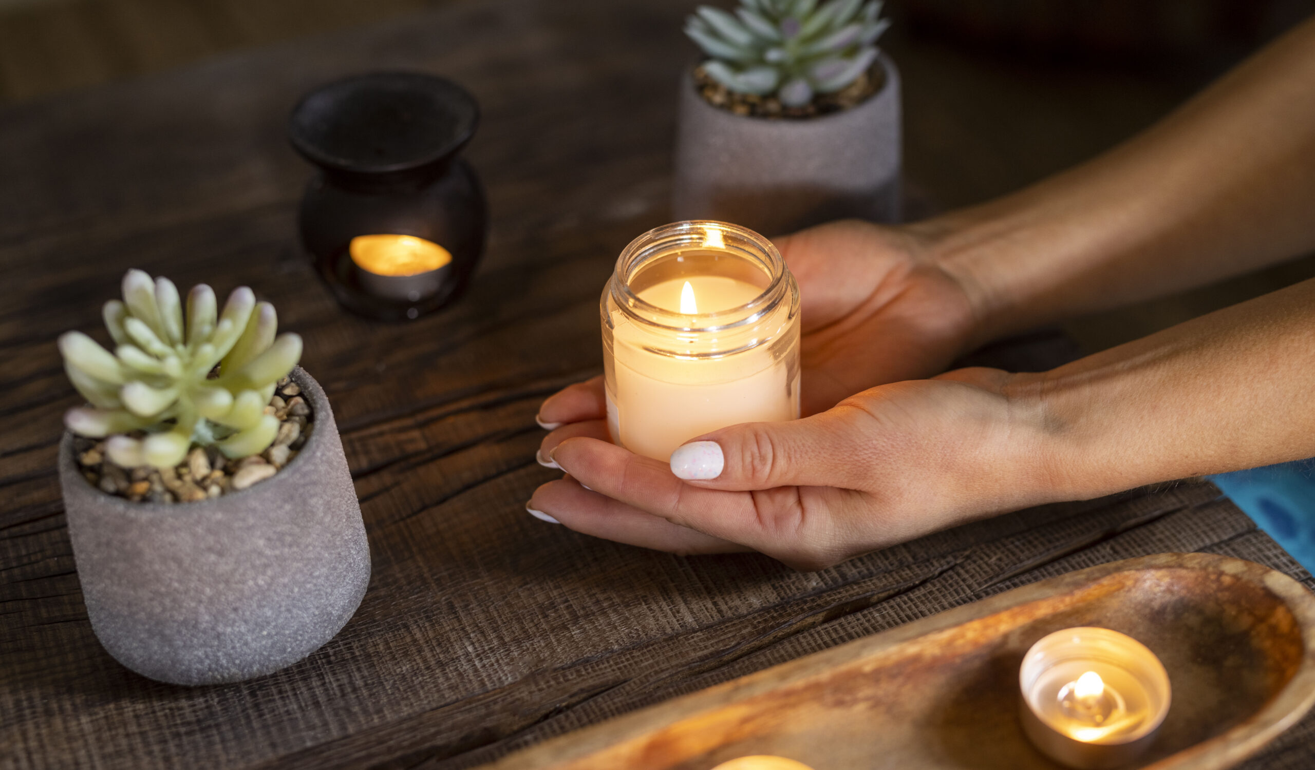 high-angle-woman-holding-candle